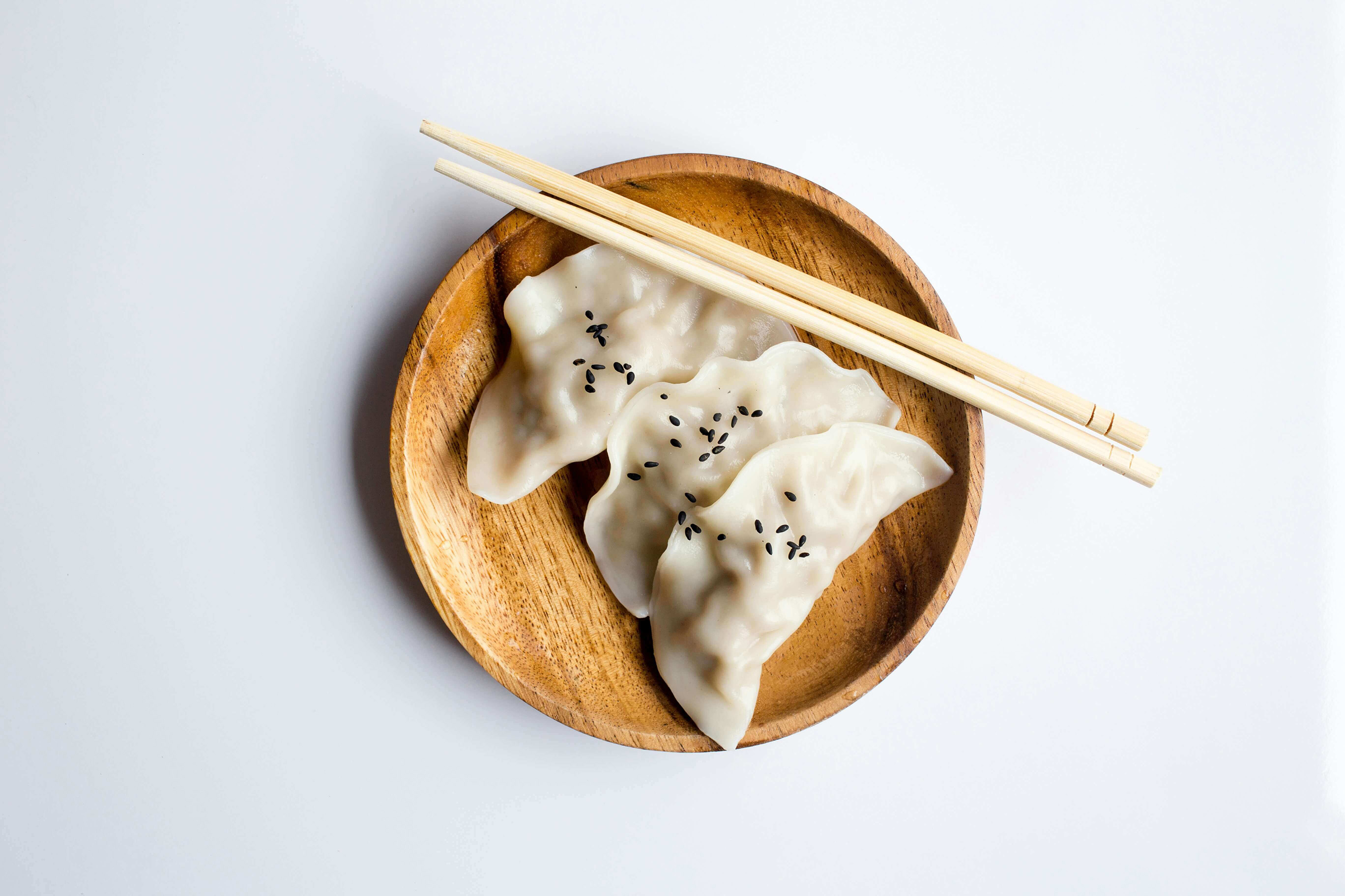 gyoza with chopsticks